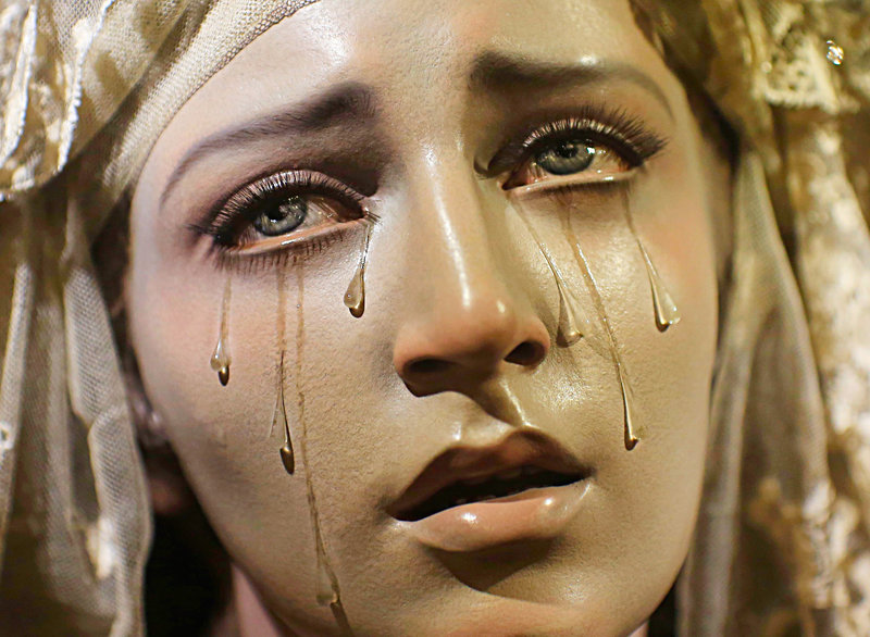A wooden carving of Virgin of the Seven Sorrows is displayed in a church in the Andalusian capital of Seville